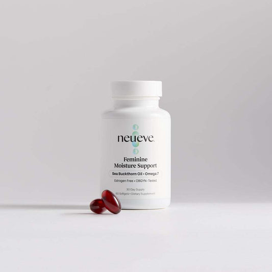 Bottle of feminine moisture support supplement with sea buckthorn oil capsules on a white background